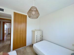 Posteľ alebo postele v izbe v ubytovaní Mirador Poniente Beach