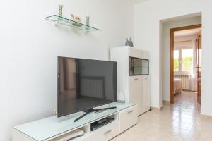 TV a/nebo společenská místnost v ubytování Gavina d'Or