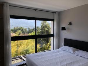 Postel nebo postele na pokoji v ubytování Les Catalons + 8 fotografií