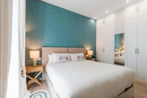Posteľ alebo postele v izbe v ubytovaní Genteel Home Sagasta + 6 fotografií