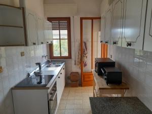 Kuchyňa alebo kuchynka v ubytovaní CASA CAMELIA