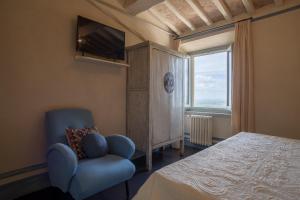 Posteľ alebo postele v izbe v ubytovaní La Dispensa-bio agriturismo