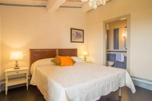 Posteľ alebo postele v izbe v ubytovaní La Dispensa-bio agriturismo