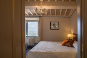 Posteľ alebo postele v izbe v ubytovaní La Dispensa-bio agriturismo
