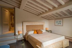 Postel nebo postele na pokoji v ubytování La Dispensa-bio agriturismo