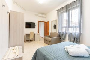 TV a/nebo společenská místnost v ubytování Hotel dei Tacchi