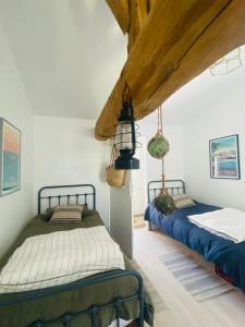 Posteľ alebo postele v izbe v ubytovaní Maison de rêve avec piscine au milieu des vignes