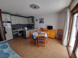 Kuchyň nebo kuchyňský kout v ubytování Apartamento LOS DORADOS