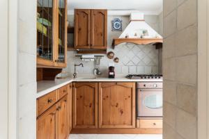 Kuchyňa alebo kuchynka v ubytovaní Casa di Mimmo con Terrazza by Wonderful Italy