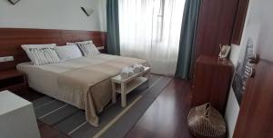 Postel nebo postele na pokoji v ubytování Apartment in Infinity Aparthotel