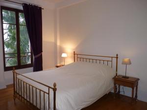 Katil atau katil-katil dalam bilik di Domaine de la Sauge