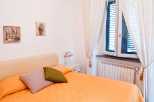 Postel nebo postele na pokoji v ubytování Mimì B&B