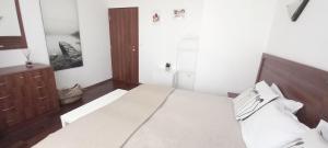 Postel nebo postele na pokoji v ubytování Apartment in Infinity Aparthotel
