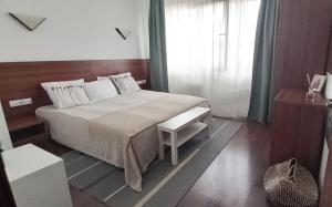 Postel nebo postele na pokoji v ubytování Apartment in Infinity Aparthotel