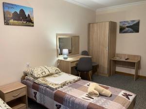 Ein Bett oder Betten in einem Zimmer der Unterkunft DW Halicz