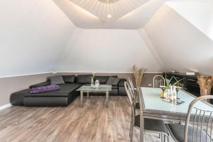 Posezení v ubytování Uhse Wohlfühloase + 26 fotografií