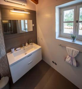Koupelna v ubytování Villa Pavicini 2181