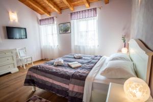 Postel nebo postele na pokoji v ubytování Villa Pavicini 2181