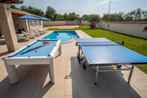 Stolní tenis v ubytování Villa Pavicini 2181 nebo okolí