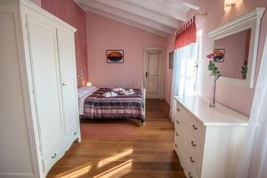 Postel nebo postele na pokoji v ubytování Villa Pavicini 2181