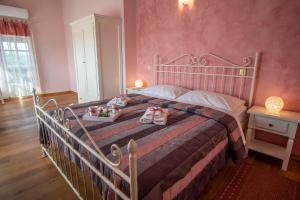 Postel nebo postele na pokoji v ubytování Villa Pavicini 2181