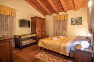Postel nebo postele na pokoji v ubytování Villa Pavicini 2181