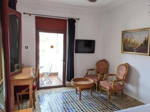 Μια τηλεόραση ή/και κέντρο ψυχαγωγίας στο Malabata Guest House