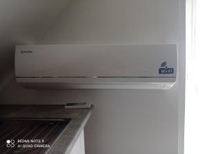 a white stove top oven in a kitchen at Casa ROOL in Turda
