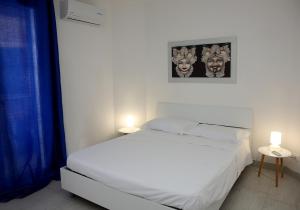 Tempat tidur dalam kamar di Ai Nidi del Borgo 1
