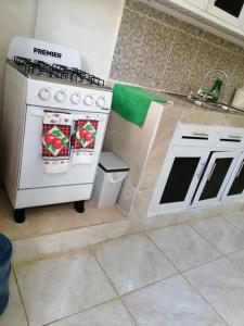 Una cocina o kitchenette en La Casa de Mamá