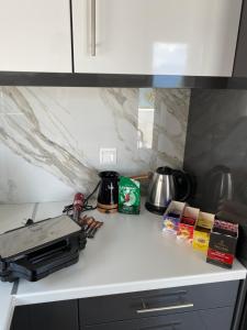 Kuchyň nebo kuchyňský kout v ubytování Billys apartment Selianitika