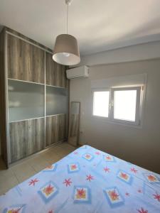 Postel nebo postele na pokoji v ubytování Billys apartment Selianitika