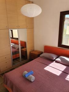A bed or beds in a room at Julia's Apartment