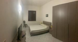 Postel nebo postele na pokoji v ubytování Casa Vacanze Mandriavecchia