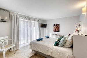 Ένα ή περισσότερα κρεβάτια σε δωμάτιο στο Villa Vermentine +26 φωτογραφίες