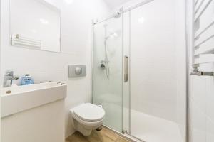 Koupelna v ubytování Pomorskie Apartamenty Baltic House + 17 fotografií