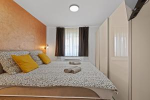 Een bed of bedden in een kamer bij Apartment Masha