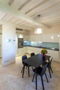 Kuchyňa alebo kuchynka v ubytovaní GoldenTuscany Apartment