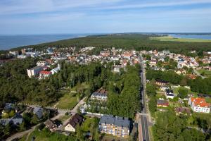 an aerial view of a small town in a city at Little Laguna Apartments SPA & Gym by Renters in Międzywodzie