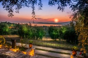 a sunset view from the garden of a villa at Kallisti Hotel in Potos