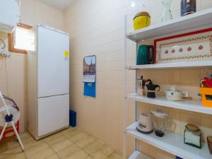 A kitchen or kitchenette at Agaete Pupe Home by Canariasgetaway