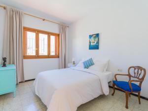 A bed or beds in a room at Agaete Pupe Home by Canariasgetaway