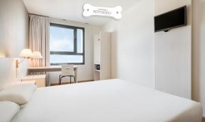 Posteľ alebo postele v izbe v ubytovaní Ilunion Valencia 3
