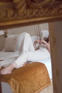 Posteľ alebo postele v izbe v ubytovaní Casa Romana Hotel Boutique