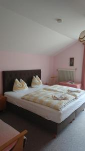 Postel nebo postele na pokoji v ubytování Haus Alpina