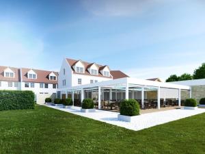 wykonanie zewnętrznej części budynku z patio w obiekcie Hotel Nationalpark w mieście Illmitz