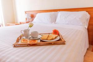 Postel nebo postele na pokoji v ubytování B&B Puerto Seguro