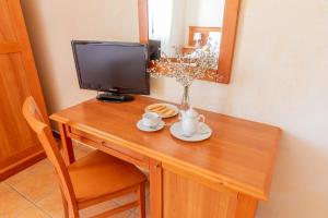 Příslušenství pro přípravu čaje a kávy v ubytování B&B Puerto Seguro