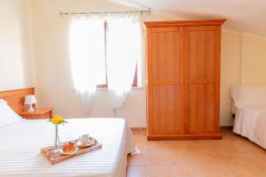 Postel nebo postele na pokoji v ubytování B&B Puerto Seguro