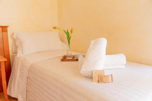 Postel nebo postele na pokoji v ubytování B&B Puerto Seguro